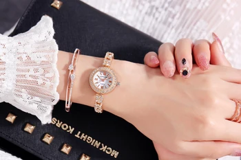 KINGNUOS Žien high-end módny náramok z nerezovej ocele sledovať crystal analóg quartz hodinky dámske športové šaty hodiny
